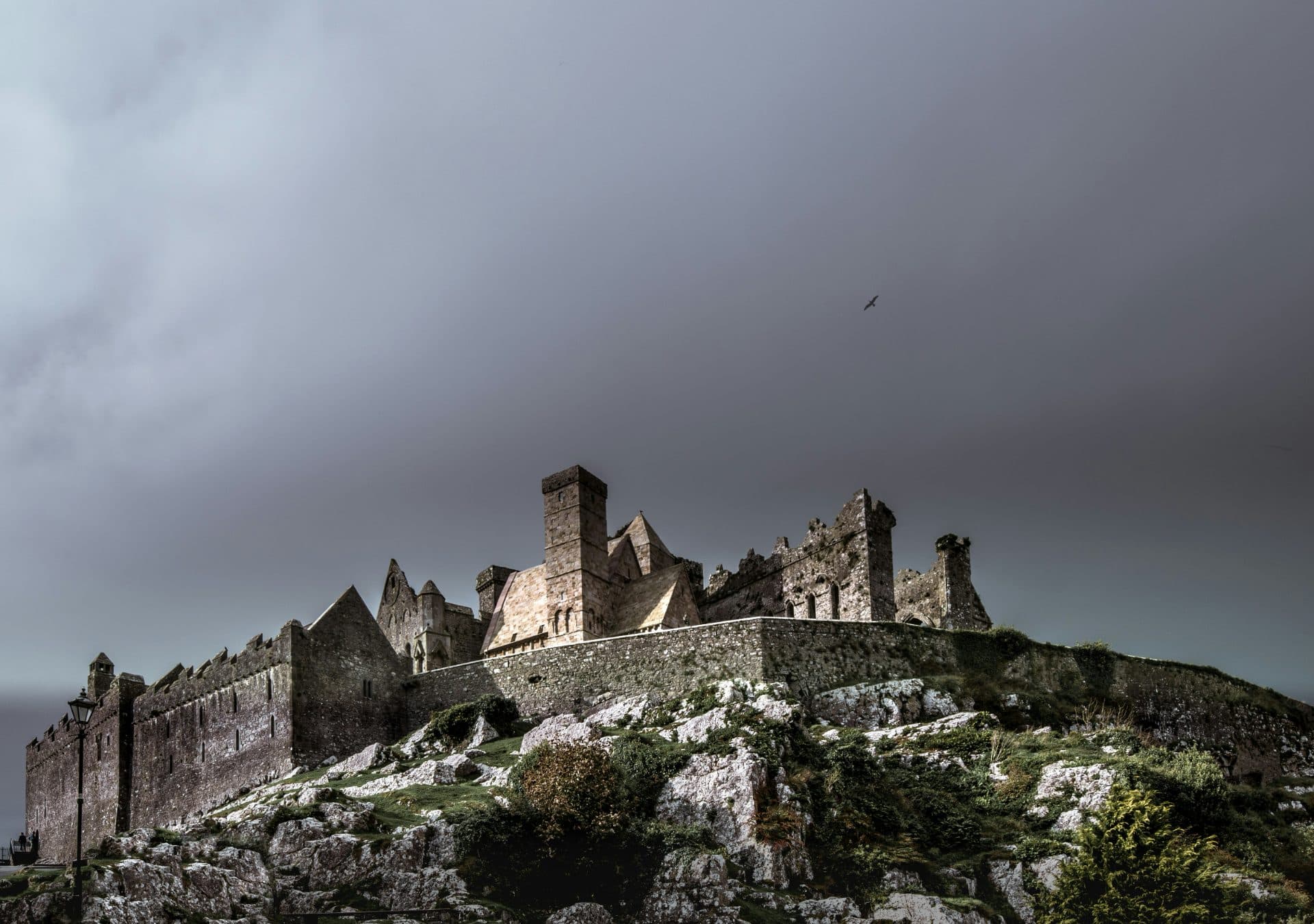 Rock of Cashel under storm clouds